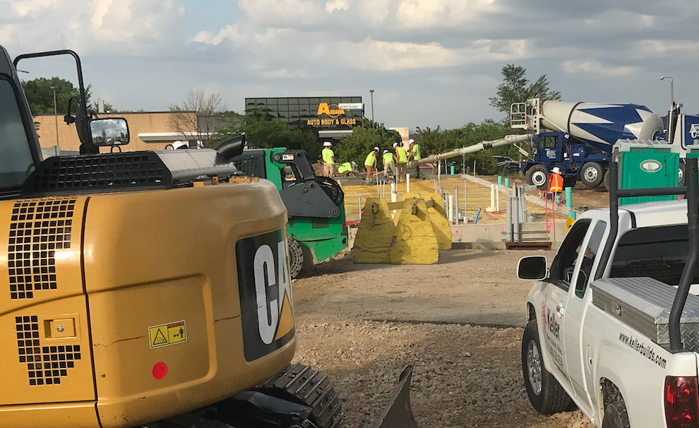 employees on jobsite working with concrete