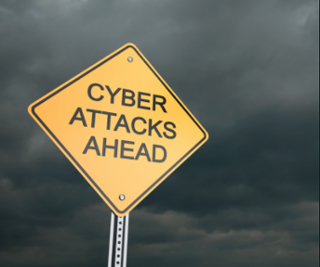 cyber attacks ahead road sign