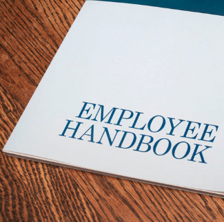 close up of employee handbook cover