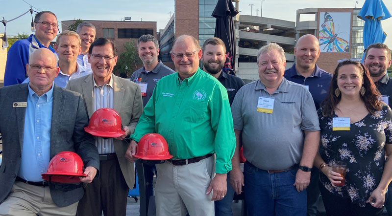From left to right in front, State Senator Dan Feyen, State Representatives Dave Murphy and Dave Schraa with their "Building Wisconsin" Award Hard Hats.