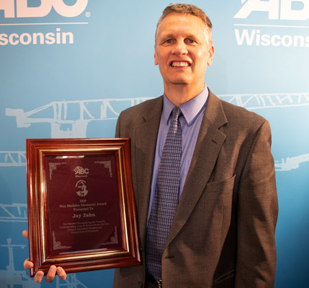 Photo of Jay Zahn with his award